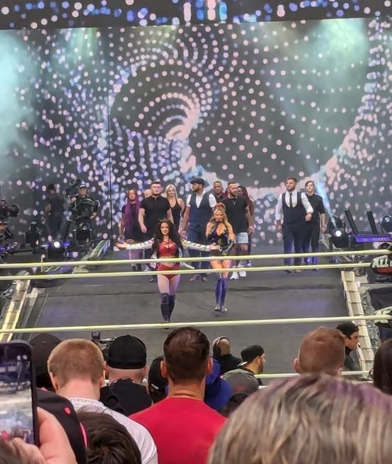 Saraya and Harley Cameron enter with their entourage