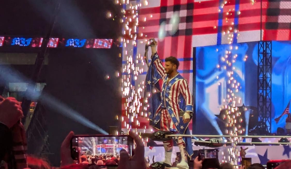MJF holds the AEW American Title aloft during his entrance