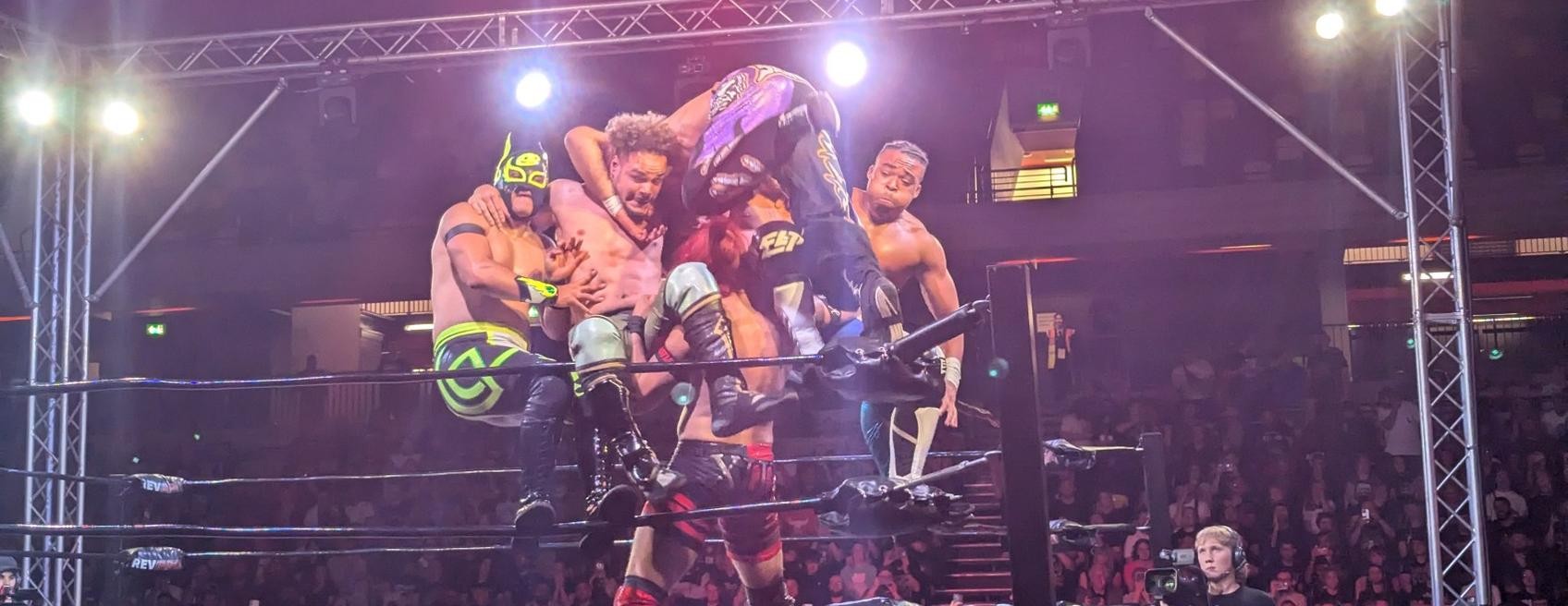 Will Kaven delivering a multi-man superplex